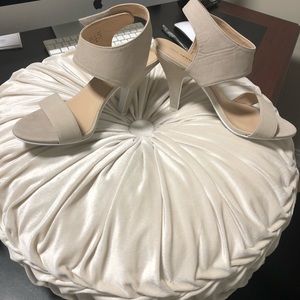 Used Call it Spring Nude Strap heels.
